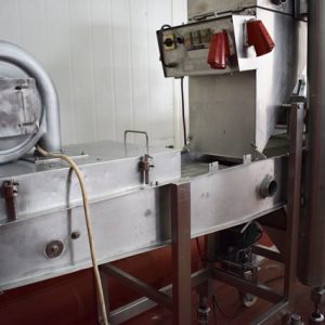 Línea de empanado y encolado Koppens, constituida por dos máquinas: una encoladora y una empanadora pero pueden trabajar por separado